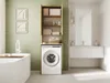 A modern bathroom with a washing machine and storage unit next to a bathtub, and a vanity with a mirror on the opposite wall. Anteprima dell’immagine prodotto