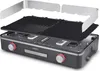 An exploded view of a Medion LIFE Tischgrill with dual-zone system and two plates, showing its components separated. Produktbild-Vorschau