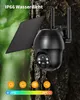 A black solar-powered security camera mounted on a tree trunk, with a solar panel attached. Náhled obrázku produktu