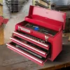 A red toolbox with three drawers, open and filled with tools, sitting on a workbench. Náhled obrázku produktu