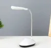 A white LED desk lamp with a flexible neck is placed on a white surface against a light gray background. Produktbild-Vorschau