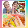 Collage of children making and showing loom band bracelets, and a close-up of a loom band bracelet. Produktbild-Vorschau