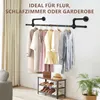 A wall-mounted metal clothes rack with various garments hanging on it, and a shoe rack with shoes below. Produktbild-Vorschau
