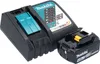 A black Makita battery charger with a teal insert and a black Makita 18V battery are shown on a white background. Anteprima dell’immagine prodotto