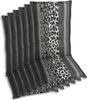 A stack of chair cushions with a leopard print pattern. Produktbild-Vorschau