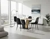 A dining set with a table and four chairs in a modern dining room with large windows. Produktbild-Vorschau