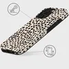A phone case with a dalmatian-like pattern is shown from a diagonal angle. Podgląd zdjęcia produktu