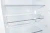 An empty refrigerator interior with shelves. Produktbild-Vorschau
