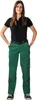 A woman is standing and posing for a product photo, wearing work pants. Produktbild-Vorschau