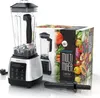 A silver and black blender with its box packaging, which features colorful vegetables and fruits, is displayed on a white background. A black power cord and a black blender tamper are also visible. Produktbild-Vorschau