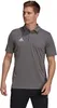 A man wearing an Adidas polo shirt. Podgląd zdjęcia produktu