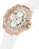 A close-up, angled view of a women's Guess watch with a white band and rose gold casing. Náhľad obrázku produktu