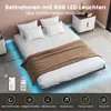 A bed frame with RGB LED lights in a bedroom setting. Náhled obrázku produktu
