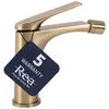A gold-colored bidet faucet with a warranty tag. Anteprima dell’immagine prodotto