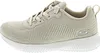 A side view of a beige Skechers sneaker. Voir les images du produit