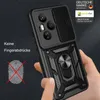 A hand holding a black smartphone case with a ring holder and camera cover. Produktbild-Vorschau