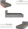 A collage of images showing a gray upholstered bed frame from different angles, highlighting its design and features. Produktbild-Vorschau