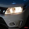 Close-up of a car's headlight and front bumper. Podgląd zdjęcia produktu