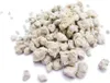 A pile of light-colored, porous stones on a white background. Produktbild-Vorschau