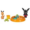 A collection of toys, including figures, a bucket, and a water play set, arranged on a white background. Náhľad obrázku produktu