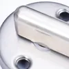 Close-up view of a metal door lock mechanism. Voir les images du produit