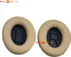 Two beige ear pads for headphones, one marked 'L' and the other 'R', are shown against a white background. Produktbild-Vorschau