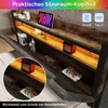 A close-up view of a bed headboard with integrated shelves, lighting, and charging ports. Anteprima dell’immagine prodotto