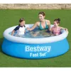 A family enjoying an inflatable pool in a backyard. Anteprima dell’immagine prodotto