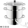 A stainless steel steamer pot with a glass lid and a hose attachment, shown on a white background. Several circular icons are visible at the bottom left, indicating compatibility with different heat sources. Produktbild-Vorschau