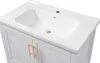 A close-up view of a white bathroom vanity with a ceramic sink and gold handles. Voir les images du produit