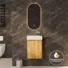 A modern bathroom vanity with a wooden cabinet and a white sink, set against a dark tiled wall. A mirror with integrated lighting is above the sink. Produktbild-Vorschau