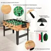 A foosball table is shown in a room with a window in the background. Various features of the table are highlighted with callout boxes and text. Podgląd zdjęcia produktu
