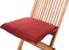 A close-up of a red seat cushion on a wooden chair. Produktbild-Vorschau