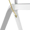 A close-up view of a white stand with a yellow cable routed through a small opening. Produktbild-Vorschau