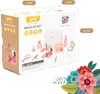 The image shows the packaging of a children's make-up set, with some of the toy items displayed on the front. Náhled obrázku produktu