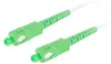 A close-up shot of two green fiber optic cable connectors. Náhľad obrázku produktu