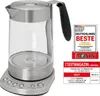 A glass and stainless steel electric kettle with controls on the base, next to award badges. Podgląd zdjęcia produktu