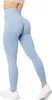 A person wearing light blue leggings, shown from the back. Produktbild-Vorschau