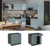 A modern kitchen with light blue-gray cabinets and a dark gray countertop, featuring a dining table and chairs in the foreground. Below the main kitchen scene are two separate images of kitchen base cabinets. Voir les images du produit