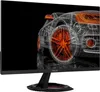 A wireframe rendering of a sports car with orange accents is displayed on a computer monitor. Produktbild-Vorschau