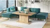 A modern living room scene featuring a teal sectional sofa and a wooden coffee table. Produktbild-Vorschau