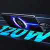 A smartphone is shown charging with a glowing animation on its screen, indicating fast charging. The text '120W' is prominently displayed in the foreground. Anteprima dell’immagine prodotto