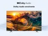 A television displaying a dynamic image of a wave crashing at sunset, with Dolby Audio branding and text. Náhľad obrázku produktu