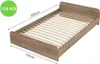 A wooden bed frame with a slatted base, shown from a diagonal angle. Náhľad obrázku produktu