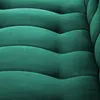 A close-up view of a tufted green sofa with horizontal channel tufting. Produktbild-Vorschau