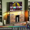 A TV stand with a television on top and LED lighting. Podgląd zdjęcia produktu