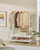 A white garment rack with clothes and shoes displayed on it. Náhled obrázku produktu