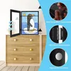 A children's picture frame displaying a drawing of a penguin is shown on top of a dresser. The frame is open, revealing its interior and features.  Additional close-up images highlight the frame's materials and construction. Produktbild-Vorschau