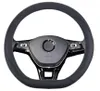 A black steering wheel cover on a car steering wheel. Produktbild-Vorschau