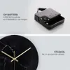 A split image showing a clock mechanism and a close-up of a marble clock face. Anteprima dell’immagine prodotto